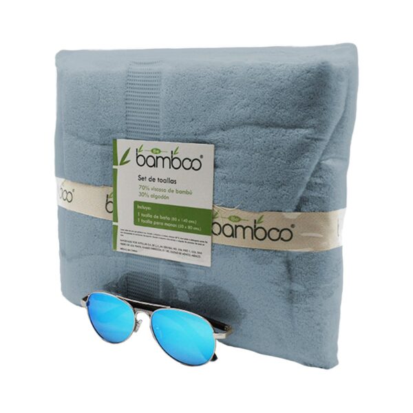 toallas de bambú y lentes aviador azul